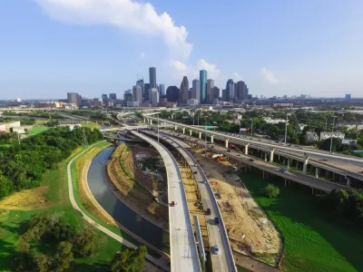 A view of Houston's freeways, with downtown in the background.
