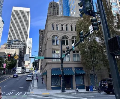 Downtown Seattle street with high-rise buildings.