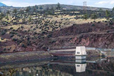 A small dam located in a rural location.