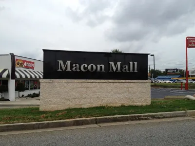 Macon Mall sign outside of low-rise building in Macon, Georgia.