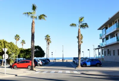 Cars parked at a beachfront building in Miami, Florida