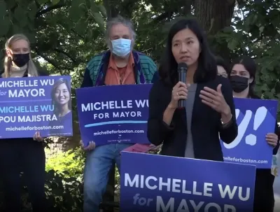 Michelle Wu campaigning for Mayor of Boston