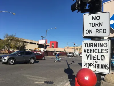 "No right turn on red" and "Turning vehicles yield to pedestrians" sign.