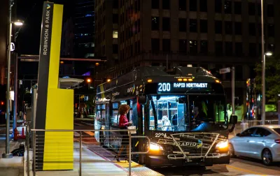 Rapid bus at station at night in Oklahoma City, Oklahoma.
