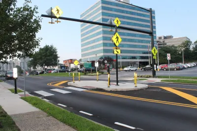 Two-lane street with pedestrian crossing island