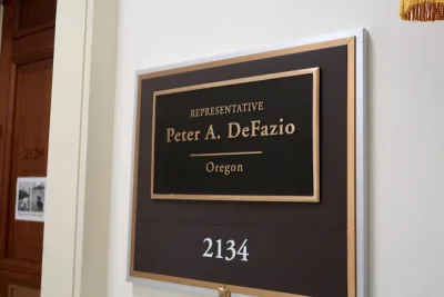A plaque displaying the name of Re. Peter A. DeFazio, senate representative for the state of Oregon.