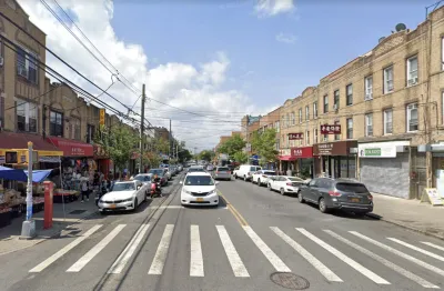 Google Street View of 8th Avenue in Brooklyn with crosswalk in foreground, cars, and brick three-story buildings