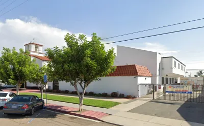 Google street view of Bethel AME church in San Diego, California. White building with red Spanis-style tile roof.