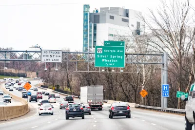 A freeway in Maryland near Washington, D.C., on the Capital Beltway with an exit sign for Wheaton.