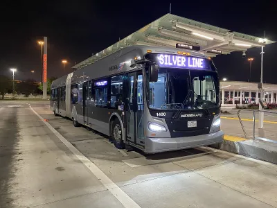 Silver Houston Silver Line bus at a dedicated bus rapid transit station
