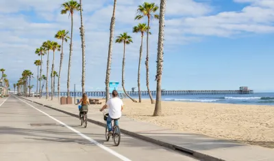 Two people on bikes in San Diego, California