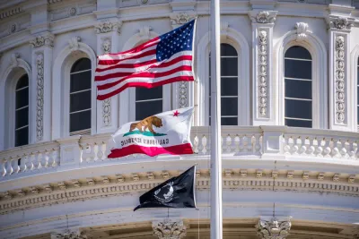 California state capitol building dome with U.S., California, and POW/MIA flags on flagpole