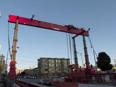 Construction crane and equipment on 4th Street for Central Subway project in San Francisco, California