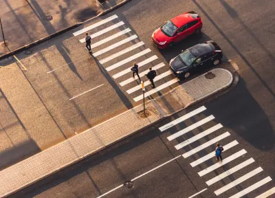 Overhead view of crosswalk with pedestrian median