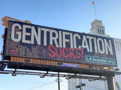 Billboard that says "Gentrification Sucks!" in Los Angeles, California