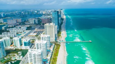 Aerial view of high-rise condominium buildings on beach in Miami, Florida