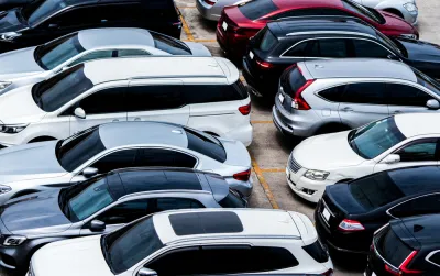 Outdoor parking lot full of cars