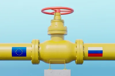 Yellow gas pipeline with E.U. flag on one side and Russia flag on the other side