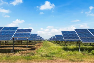 Solar panels in a green field