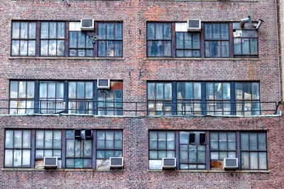 Window air conditioner units on a brick building