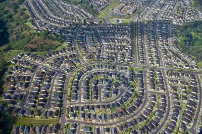 Aerial view of planned community with houses and winding streets in Pearl City, Oahu