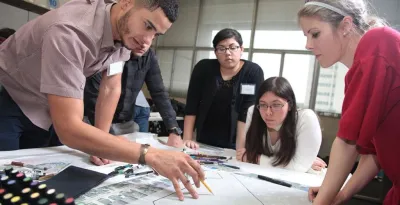 Image of students having a meeting