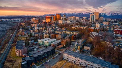 Aerial view of Anchorage, Alaska at sunrise or sunset.