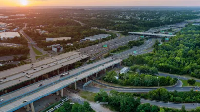 Aerial view of elevated freeways in New Jersey at dusk.