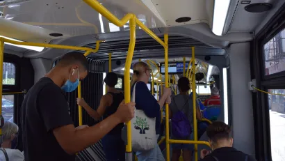 Bus riders wearing masks on a New York City bus