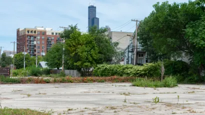 Vacant lot in Chicago, Illinois with skyline in background
