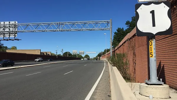 Wide asphalt road with "North Route 1" sign
