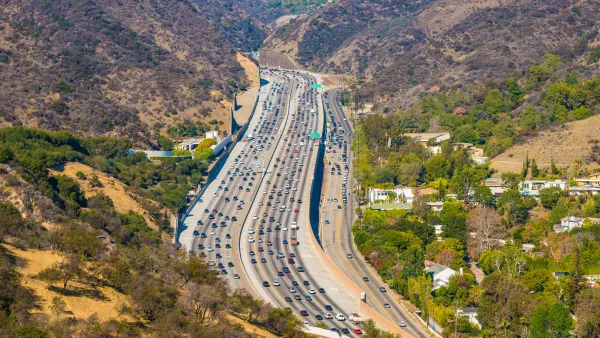 Traffic on the 405 interstate freeway through the Sepulveda Pass at Getty Center Drive in Los Angeles, California