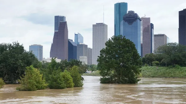 Flooded park agains the downtown Houston skyline