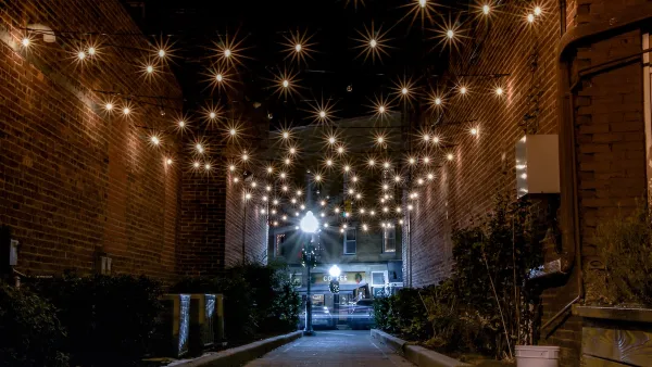 String lights across an alley in Cranford, New Jersey at night.