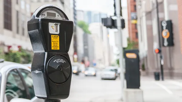 Close-up of standard grey parking meter on Chicago street.