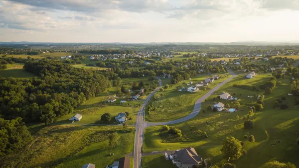 Aerial view of green rural community with houses in Pennsylvania.
