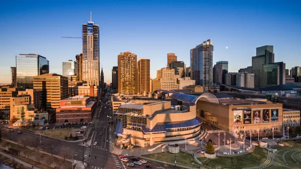 Aerial view of Denver, Colorado skyline at golden hour.