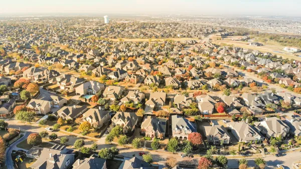 Aerial view of suburban sprawl with large single-family homes near Dallas, Texas.