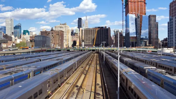 View of trainsin Hundson Yards and New York City skyline.