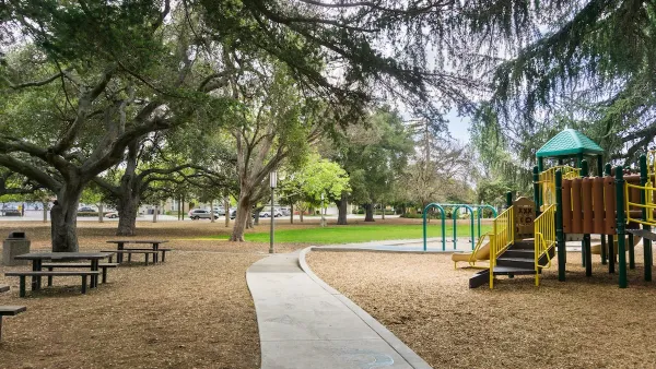 Playground and picnic benches in city park in San Francisco Bay Area.