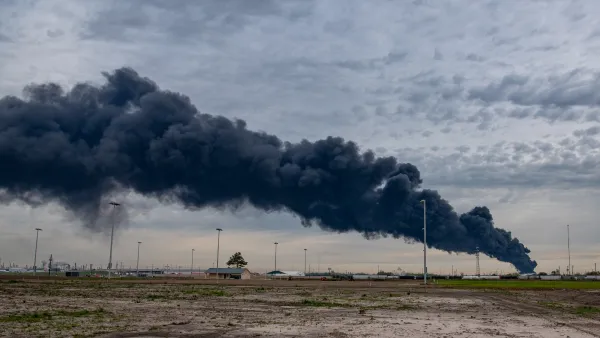 Black plume of smoke rising from petrochemical plant fire in Houston, Texas