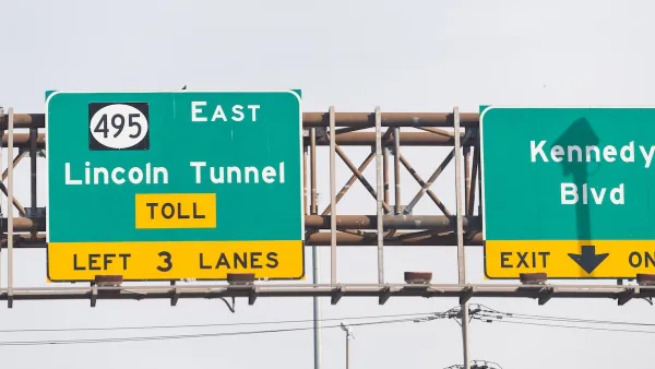 Close-up of green freeway sign for Lincoln Tunnel in New Jersey.