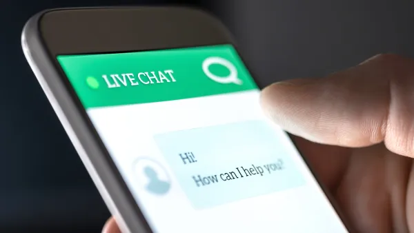 View of a phone with a chatbot interface asking user how it can help them.