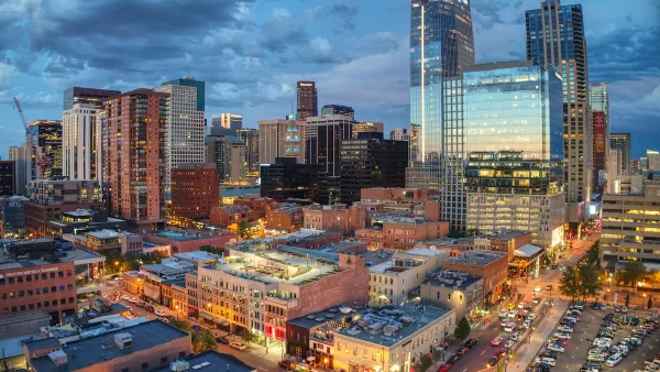 Aerial view of Denver, Colorado skyline at dusk.
