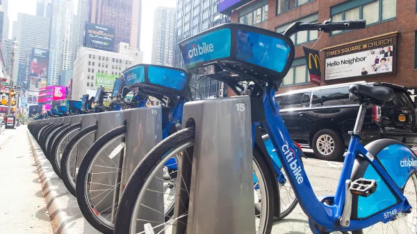 Blue Citi Bike bike share bikes parked at a station near Times Square in New York City