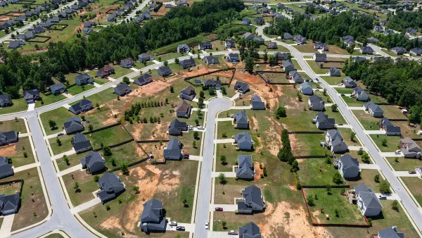 Large homes with large yards in suburban cul-de-sac near Atlanta, Georgia.