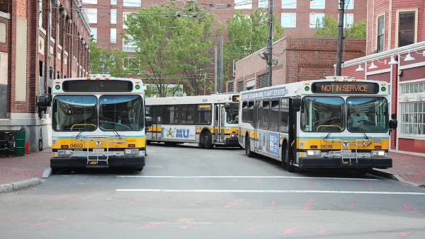 Multiple MBTA buses parked in Cambridge, Massachusetts.