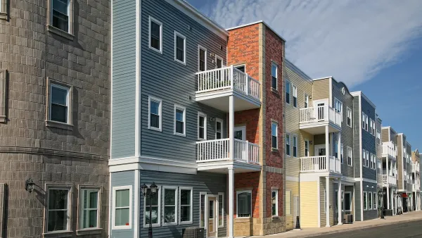 Colorful three-story multifamily housing.