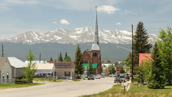 Church with tall steeple in rural Colorado.