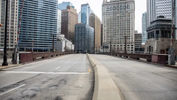 Empty street and high-rise buildings in downtown Chicago, Illinois during COvid-19 pandemic.